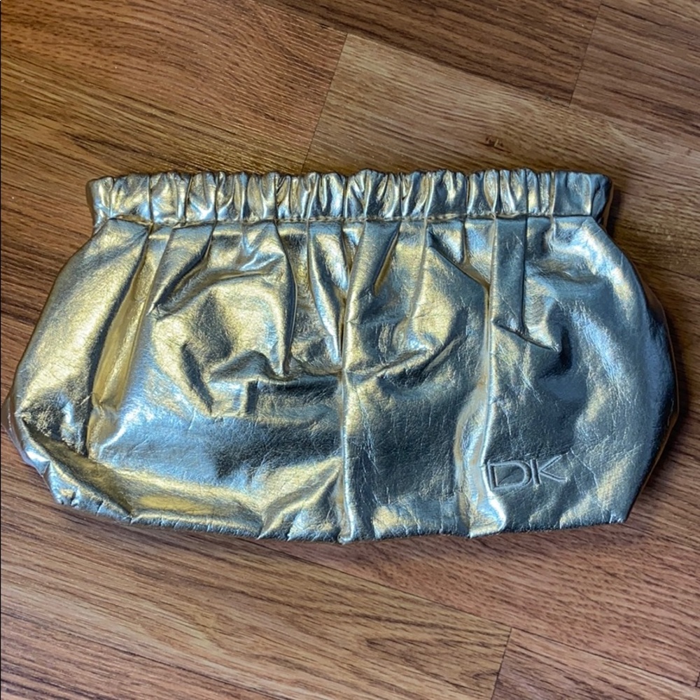 Donna Karan gold metallic cosmetic bag